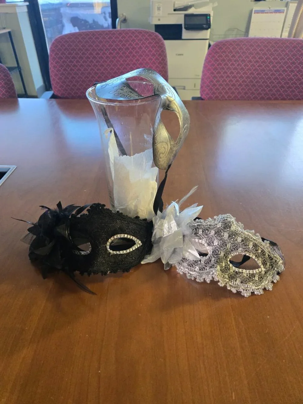 you get 5 random plastic, some fabric covered with feathers, masks